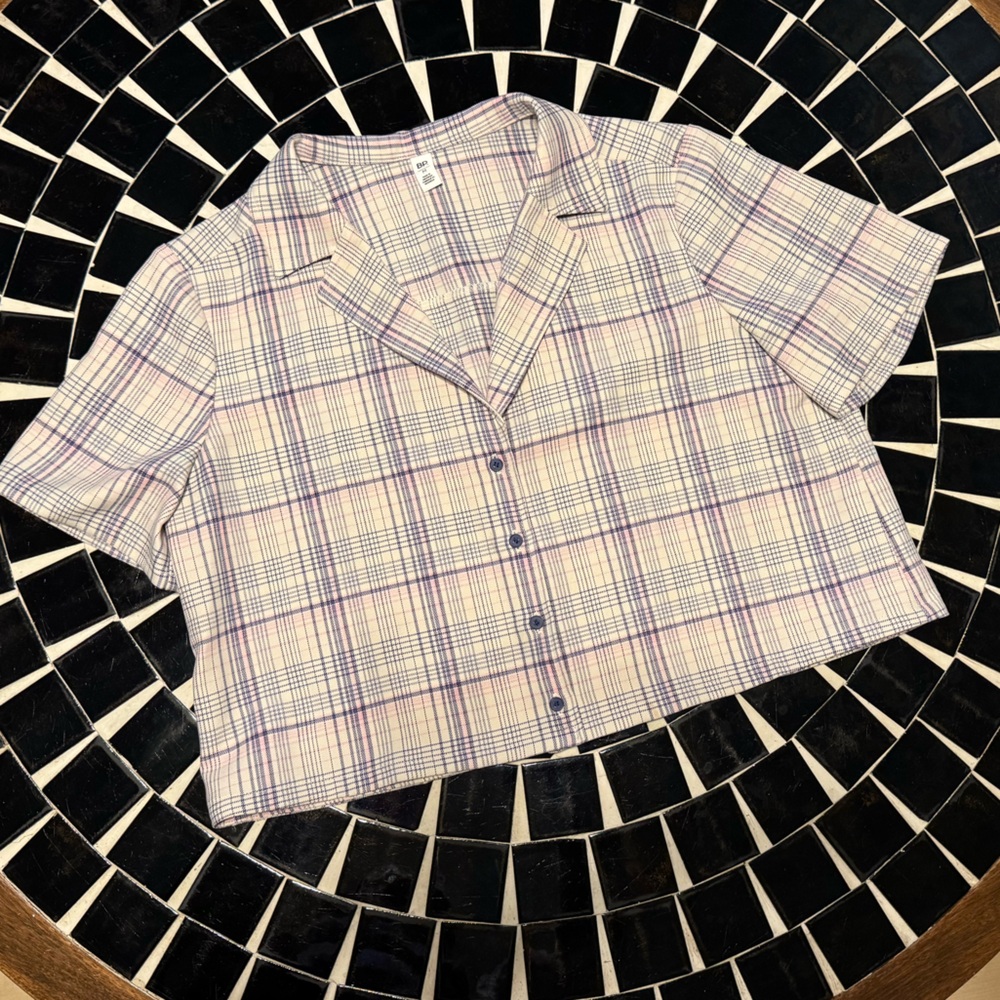 Cropped button up women’s size medium shirt.